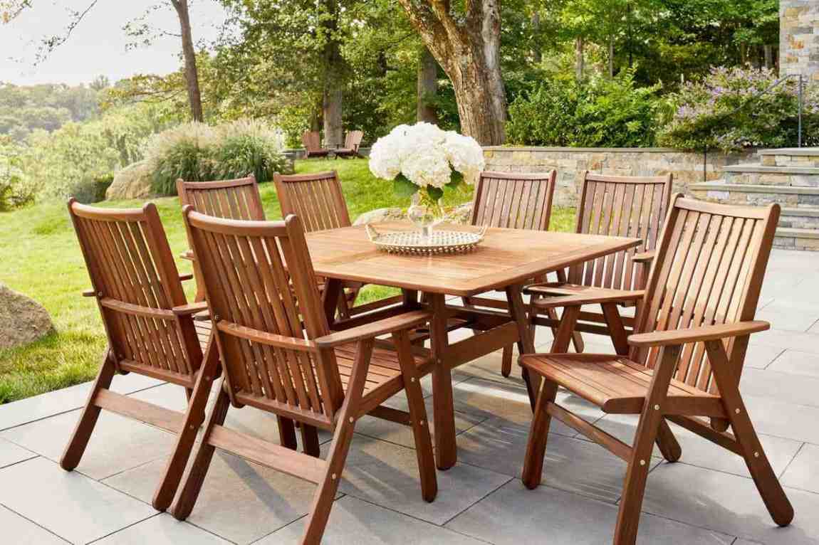 Wooden patio dining set on a garden deck showing outdoor furniture services in Nevada County